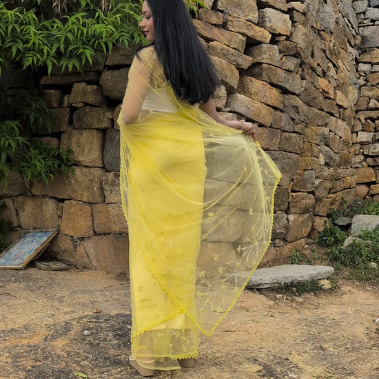 Yellow Soft Net Saree with Hand Embroidery